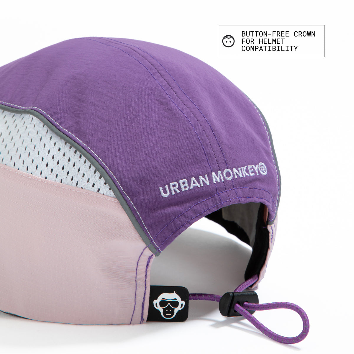 Back view of lilac, purple and pink color-block nylon cap with white logo, grey piping and adjustable strap. Urban Monkey®