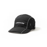 Side view of black ripstop nylon cap with grey piping and white embroidered logo Urban Monkey®