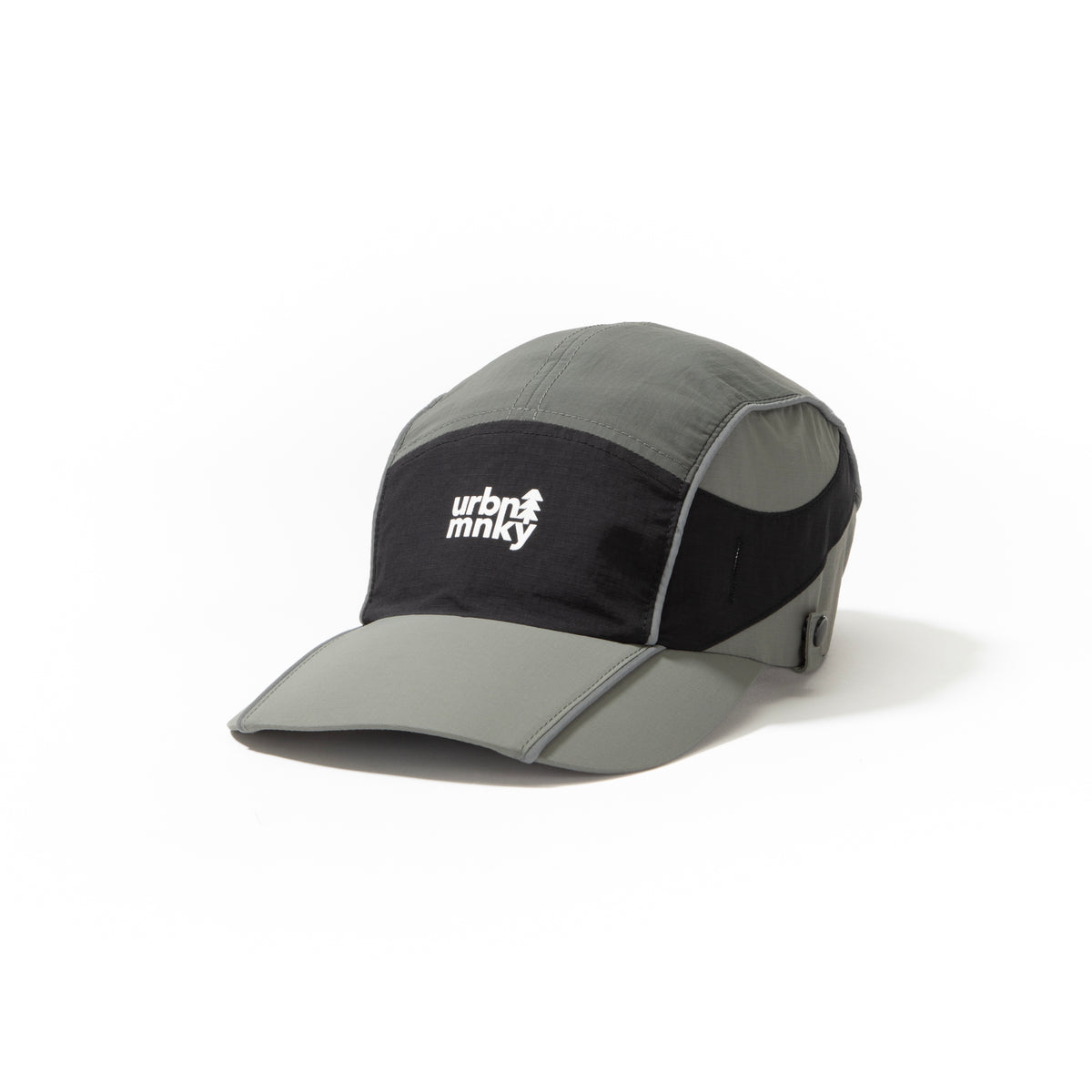 Side view of olive-grey and black color-block nylon cap with white stacked logo and pine tree icon. Urban Monkey®