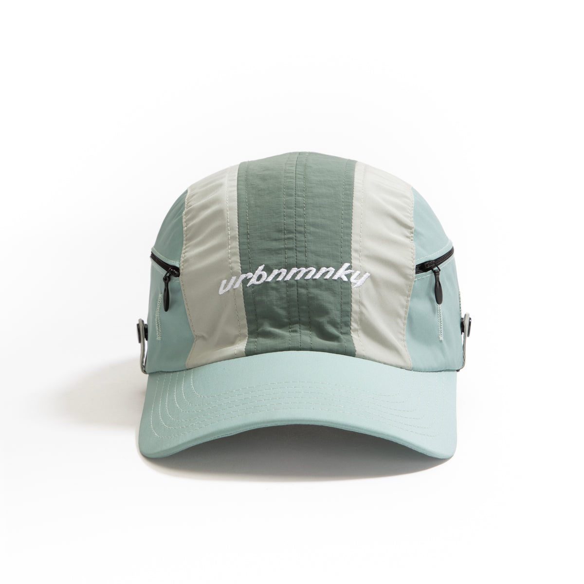 Front View sage green, grey and mint color-block nylon cap with white embroidered logo Urban Monkey®