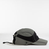 Side view of olive-grey and black color-block nylon cap with white stacked logo and metal side clip. Urban Monkey®